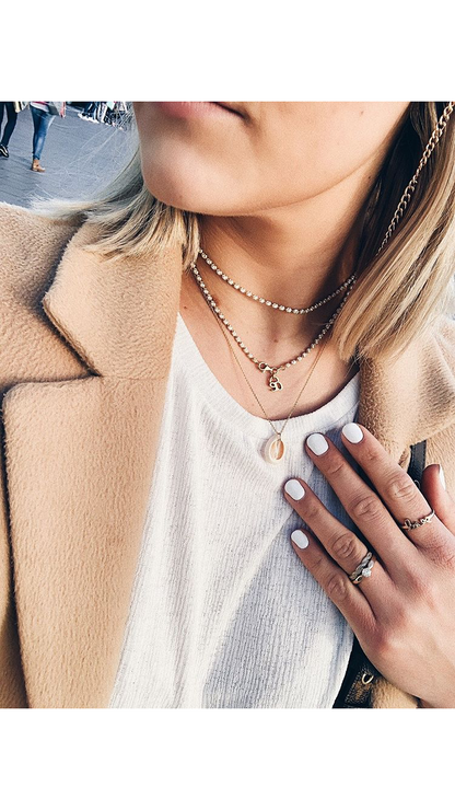 KAURI / Muschelkette